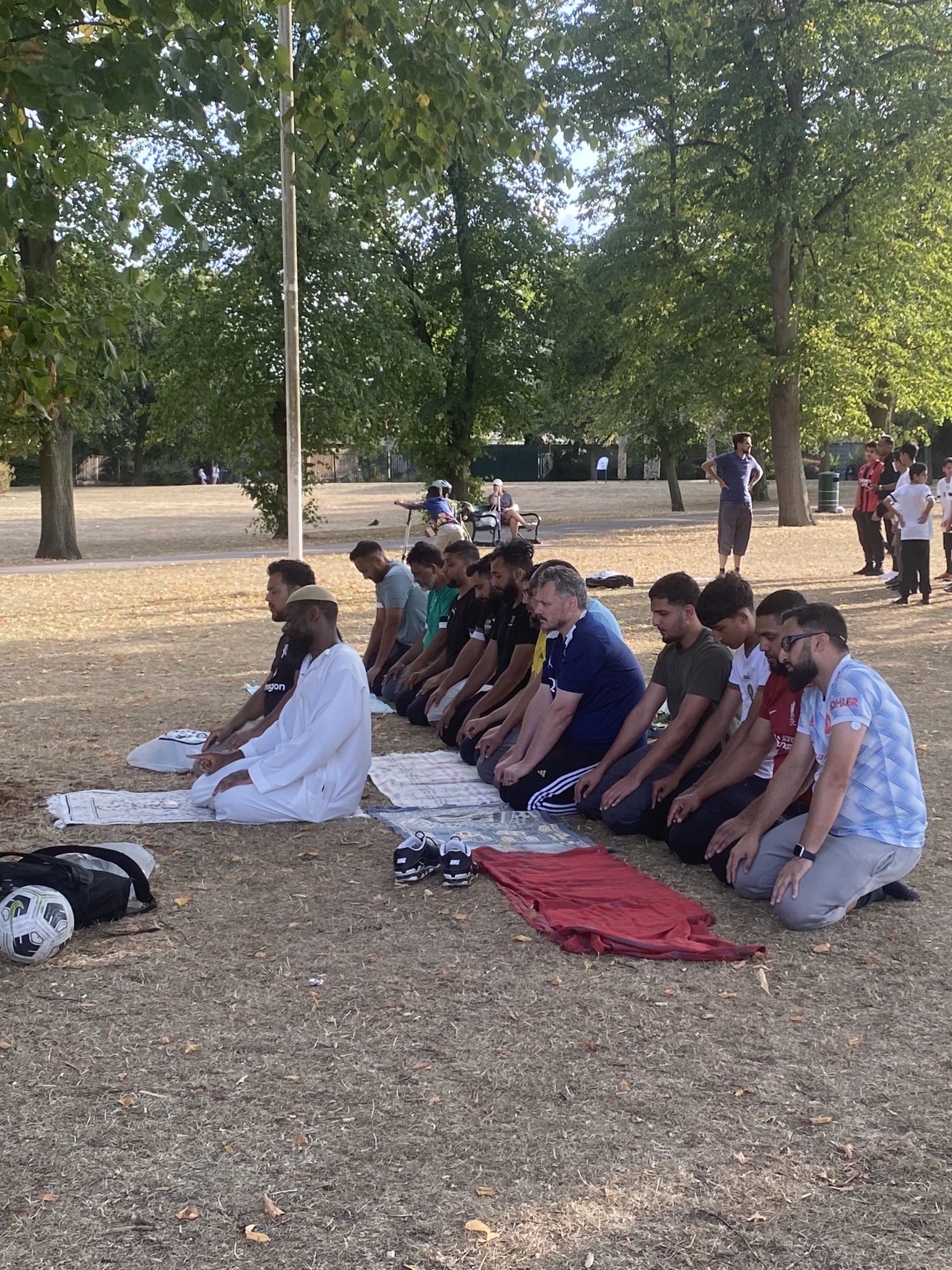 Academy members praying Asr together before training